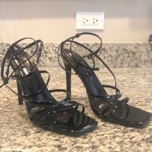 Black vinyl heels